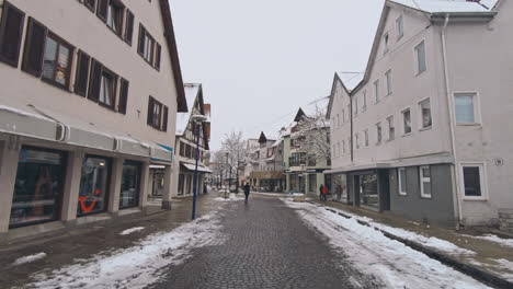 street with historical houses in metzingen, germany