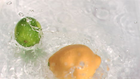 fruit falling into water in super slow motion