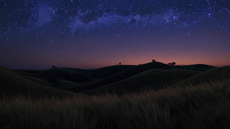 starry night and twilight over rolling hills