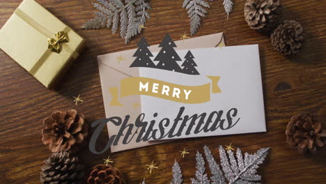 animación del texto de feliz navidad sobre las decoraciones navideñas