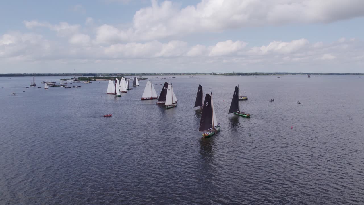 Wide view of Skutsjesilen echternerbrug Holland during summer, aerial