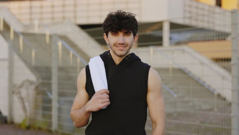 smiling man in workout outfit