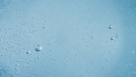 oxygen bubbles in water on a blue abstract background