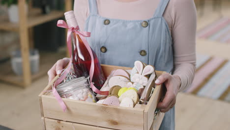 woman showing easter gift basket