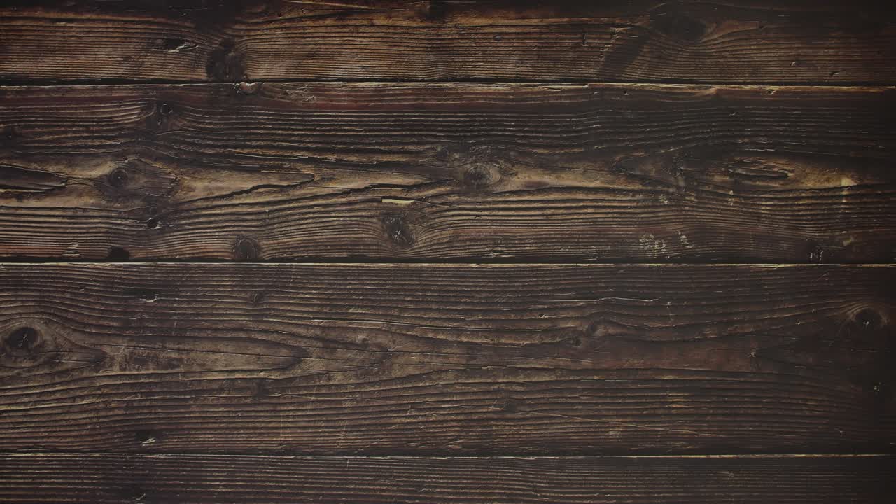 Pan eggs and wooden spoon on wooden background - Stop motion