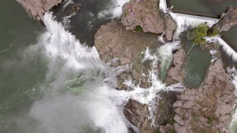 drone looking down on on twin falls waterfall