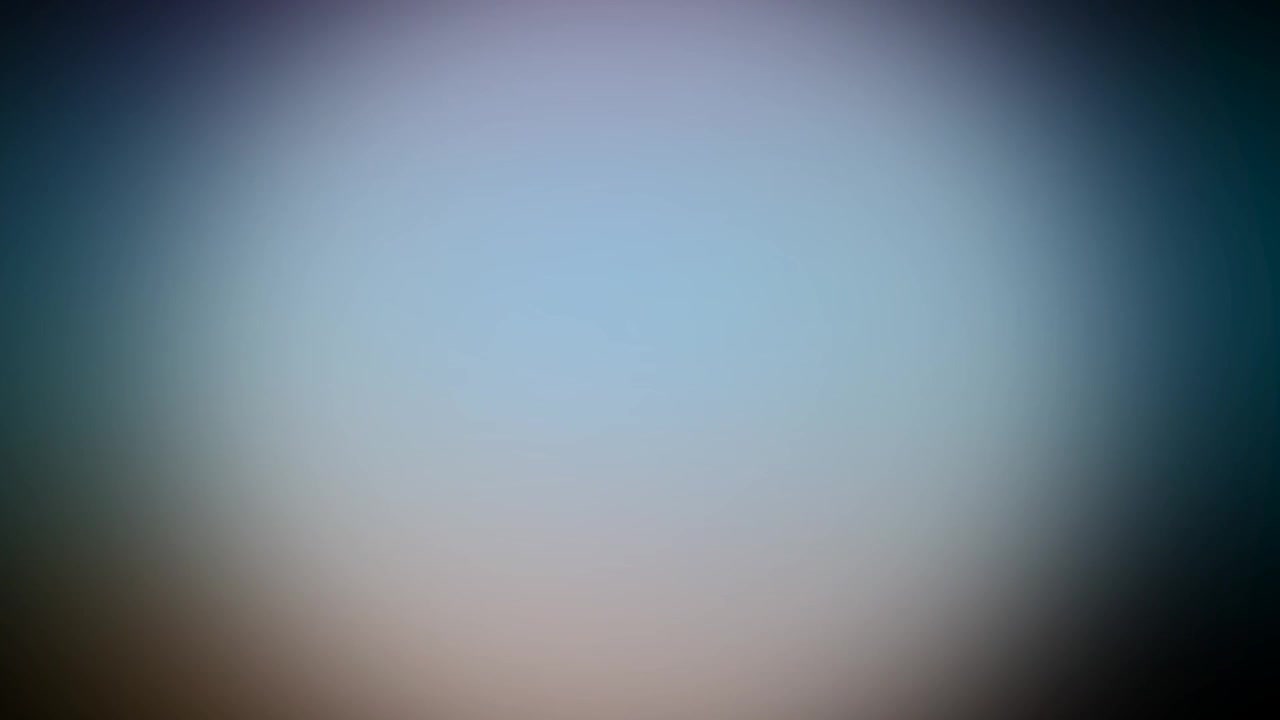 Abstract Light Leaks and Color Transitions on Dark Background