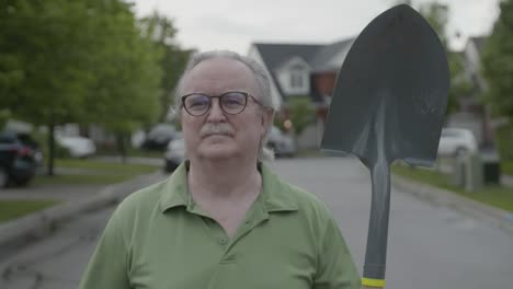 man walking forwards and flips shovel