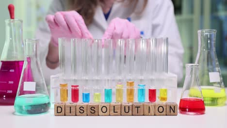 laboratory experiment with dissolution blocks and test tubes