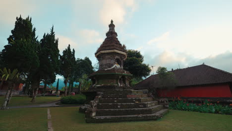 ancient stone shrine in a serene balinese temple garden
