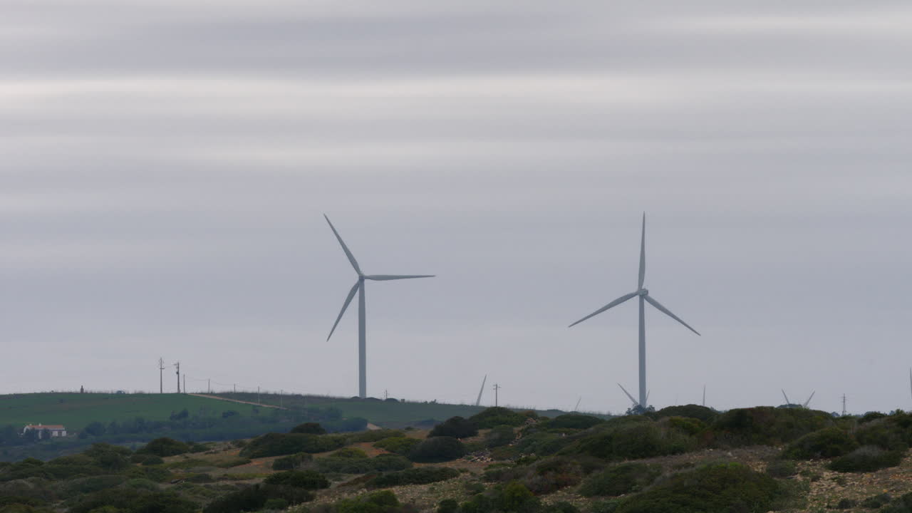 Wind power to get the energy Rotating turbines against the sky