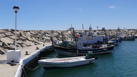 Static-Wide-Shot---Traditional-Spanish-Fishing-Boats-at-Puerto-de-La-Duquesa-in-Spain