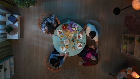 friends enjoying dinner together at home