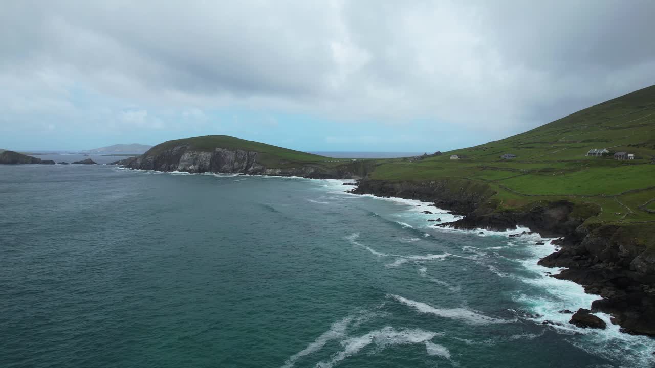 Dramatic drone view Duin Caoin Slea Head Kerry Ireland early morning with wild Atlantic swell and seas