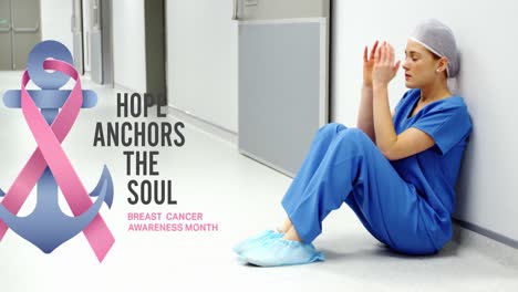 animation of breast cancer awareness text over tired caucasian female doctor at hospital