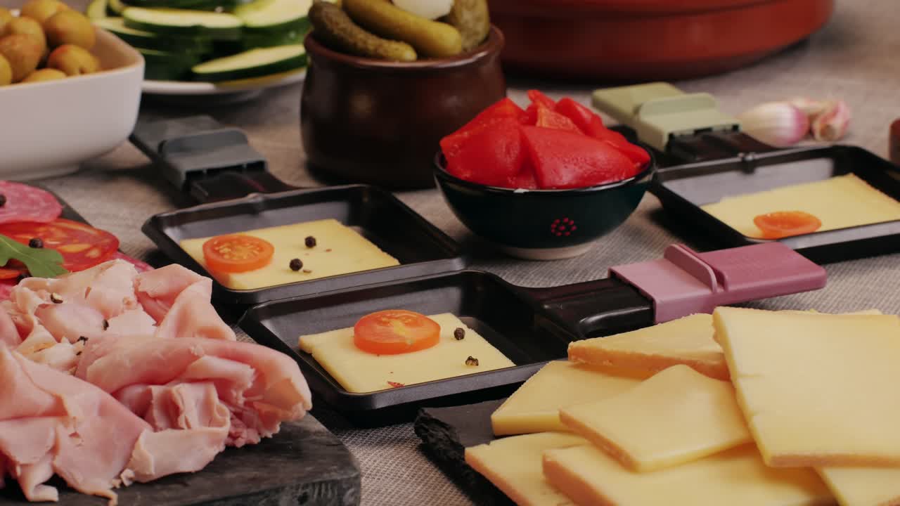 Italian or Spanish restaurant with traditional tapas food, Spanish cuisine, delicious tapas and cheese plate, bruschetta with cheese, olives dry tomatoes and tasty sandwich bar appetizer, buffet