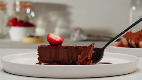 delicious chocolate cake slice with strawberry