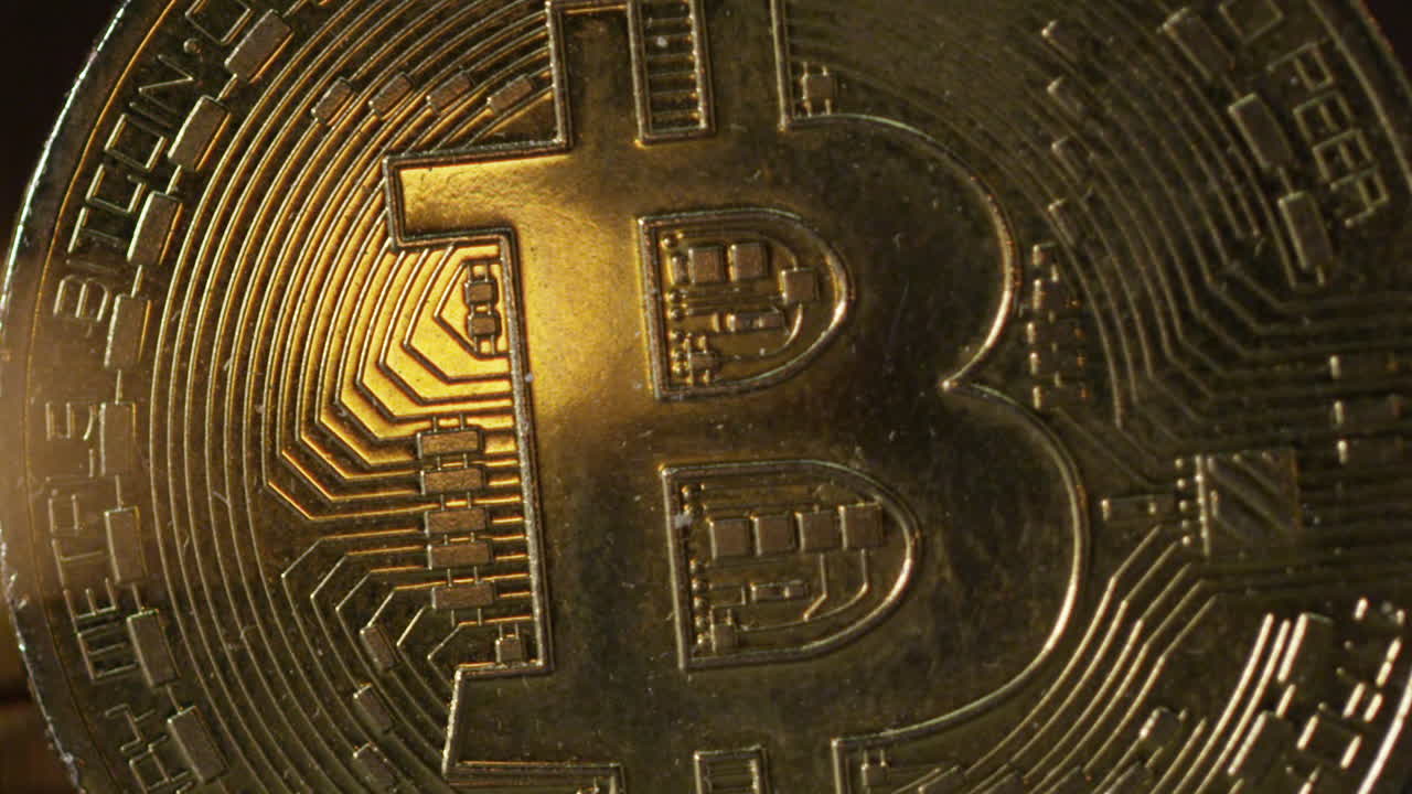 Cryptocurrency on the block chain - close up of bitcoin altcoin physical coins in dynamic setting