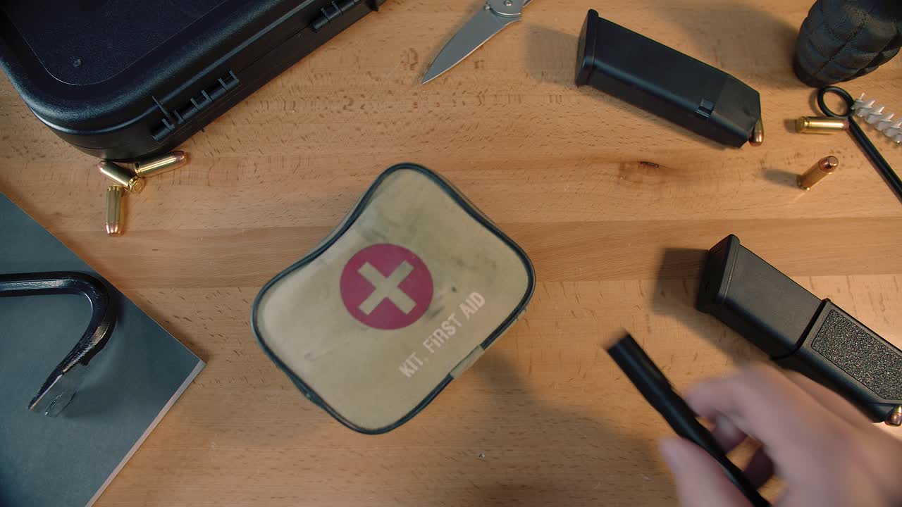 Tabletop with Tactical gear and first aid kit