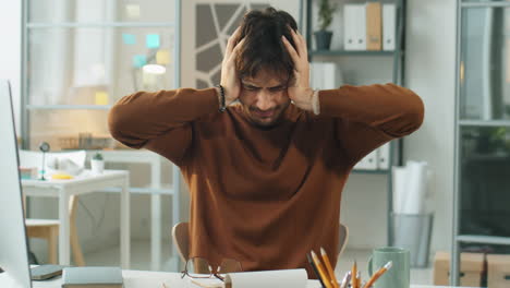 time lapse of businessman suffering from noise in office