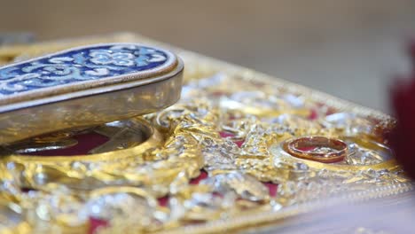 church attributes for wedding ceremony. gold crowns are on the altar. attributes of priest. interior of church