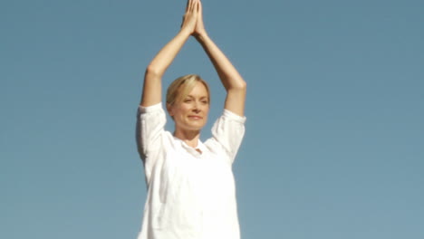 beautiful woman doing yoga meditation