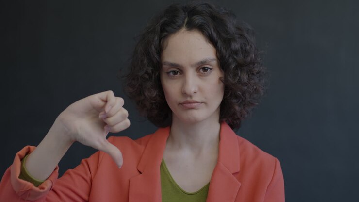 Woman Giving Thumbs Down