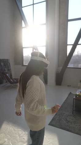 woman experiencing virtual reality in a modern living room decorated for christmas