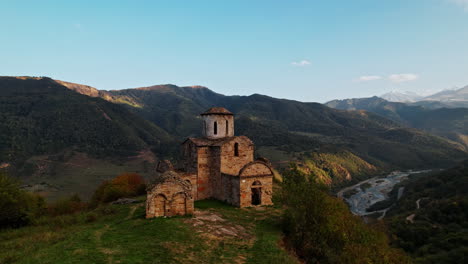 ruined church in mountainous landscape