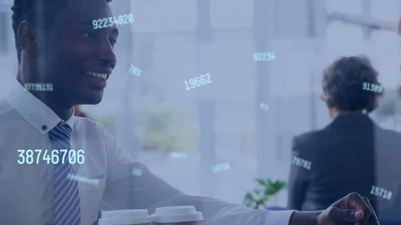 Animation of numbers processing over diverse business people in office