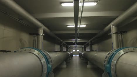 illuminating corridor with pipes