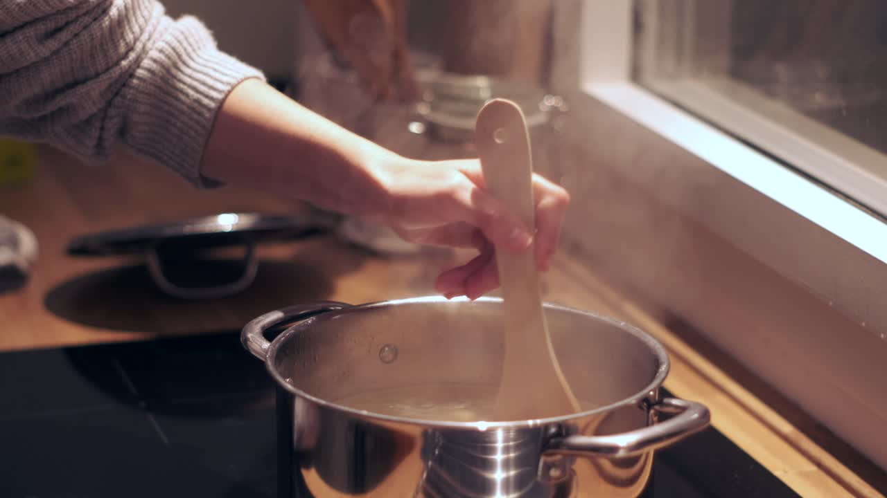 &amp;quot;Cooking up Penne: Slow Motion Close-up of Pasta Boiling in a Pot