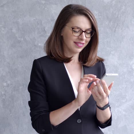 businesswoman using mobile phone  writing email or text message