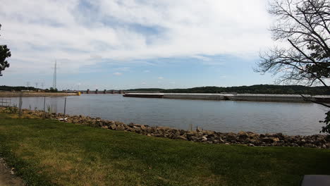 wide angle view of barge slowly moving into lock no