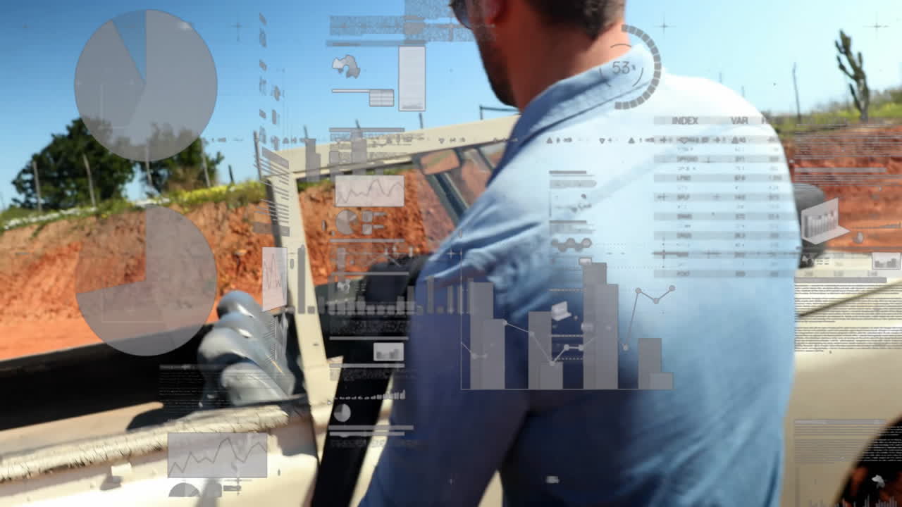 Man in denim shirt with data analytics animation over construction site background