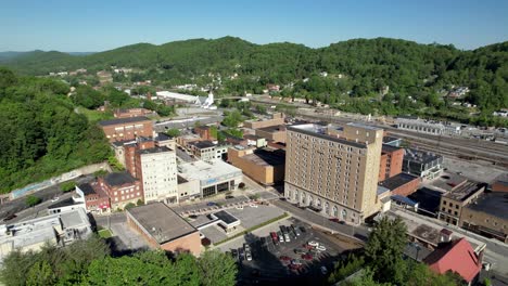 aerial push over treetops into bluefield west virginia