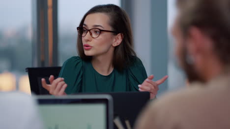 confident businesswoman discussing contract with customers