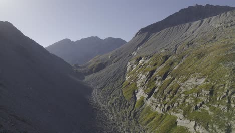 drone captures distant edelrauthütte or rifugio passo ponte di ghiaccio at sunset in the zillertal alps of south tyrol