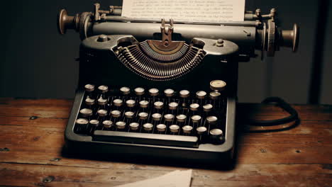 vintage typewriter on wooden desk