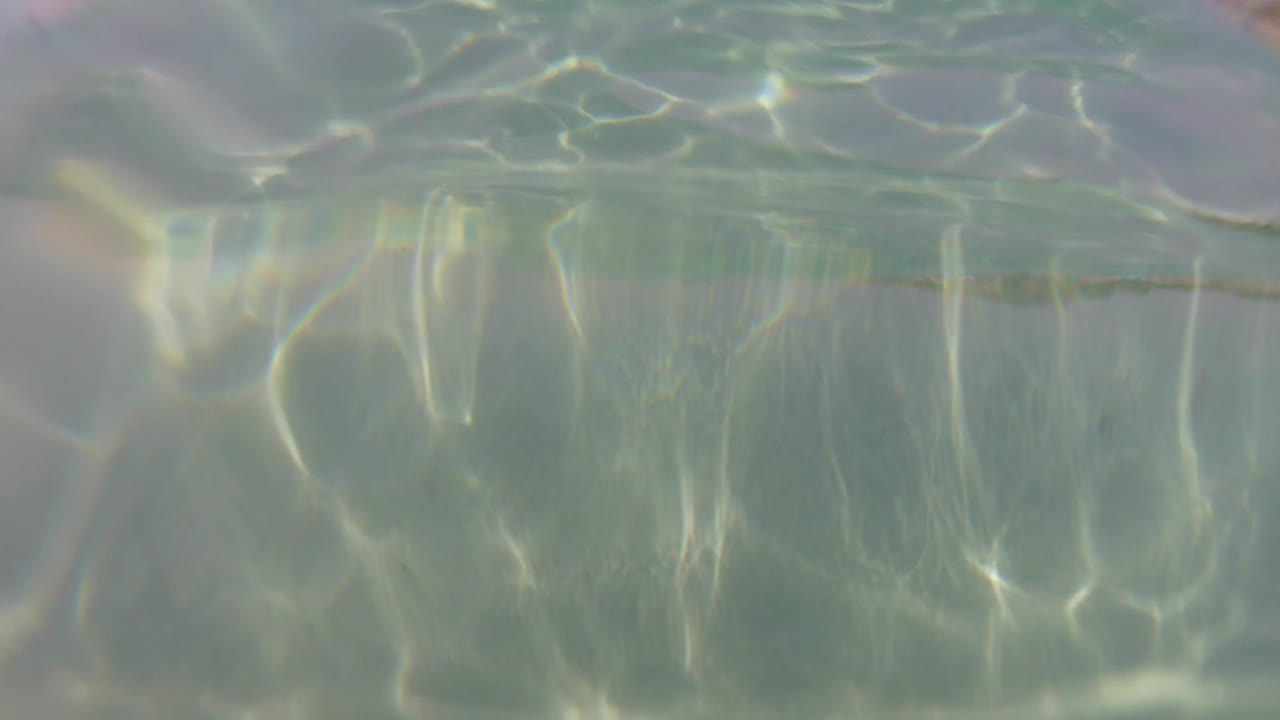 POV during swimming in the crystal water of Salento (Puglia)