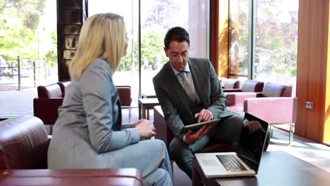 business people using digital tablet in meeting