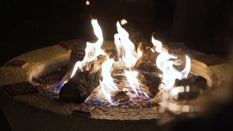 fire burning in fire pit in slow motion