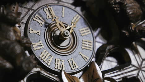 The-hands-of-a-cuckoo-clock-advance-in-this-time-lapse-shot