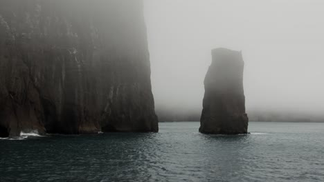 Rugged-coastline,-remote-in-fog-mysterious