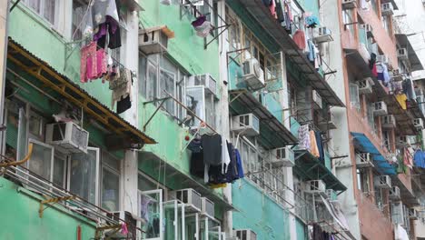 crowded old residential housing apartment building seen in kowloon district in hong kong