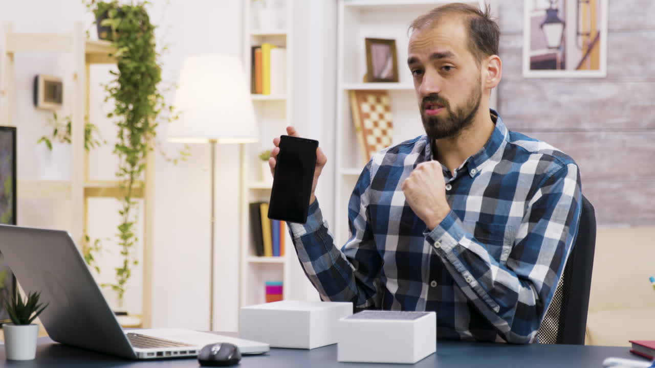 Man Unboxing New Tech Product
