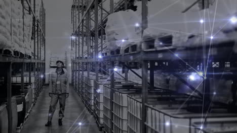 animation of network of connections over caucasian male warehouse worker