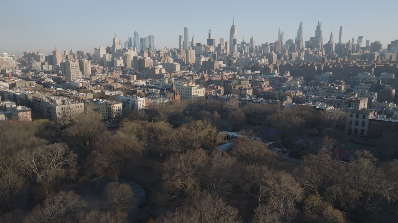 Aerial view of Manhattan’s Tompkins Square Park. Shot looking north towards Midtown and The Empire State Building.