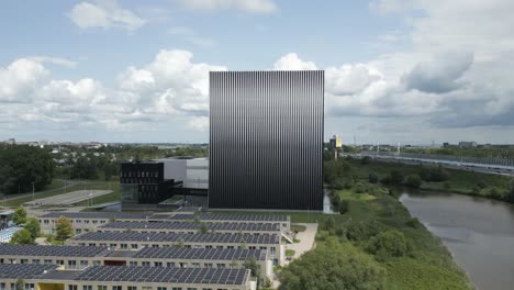 drone footage of an equinix data center in amsterdam, a critical facility for hosting cloud platforms, ai models, enterprise servers, and internet infrastructure