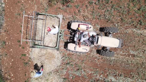 man working with tractor equipment